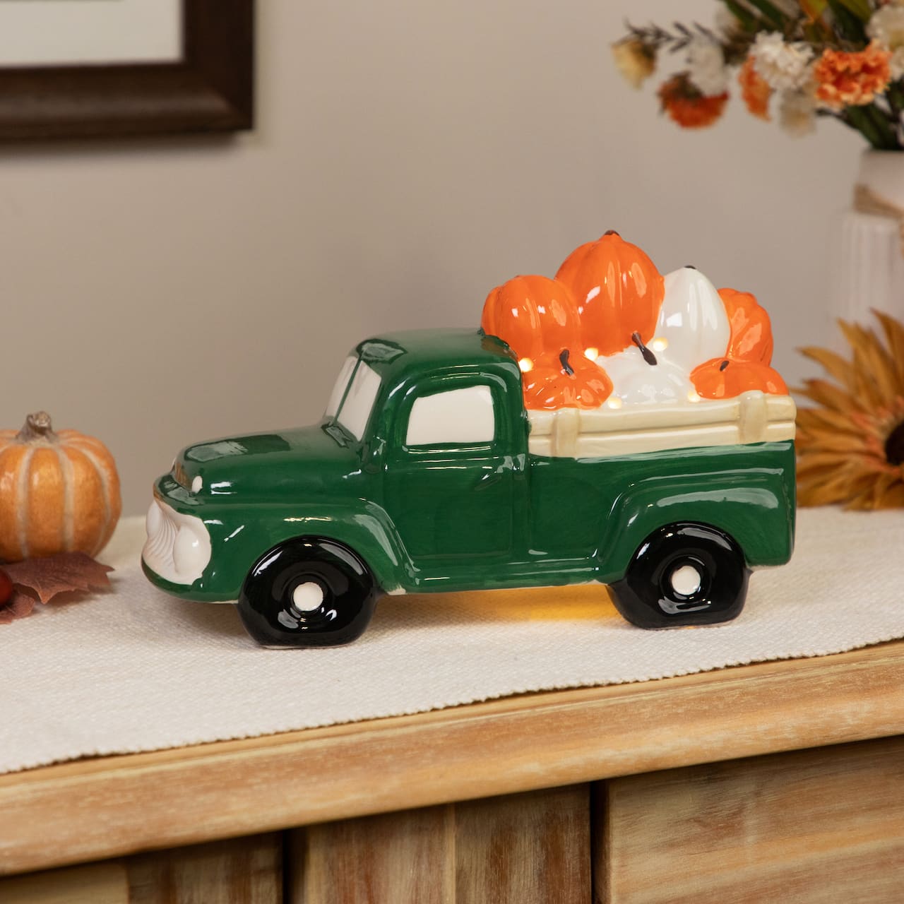 9.5" LED Lighted Green Ceramic Truck Hauling Pumpkins Autumn Harvest Decoration